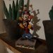 Disney Figur Kalle och Långben klär granen
