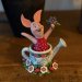 Disney Figur Nasse vattnar blommor