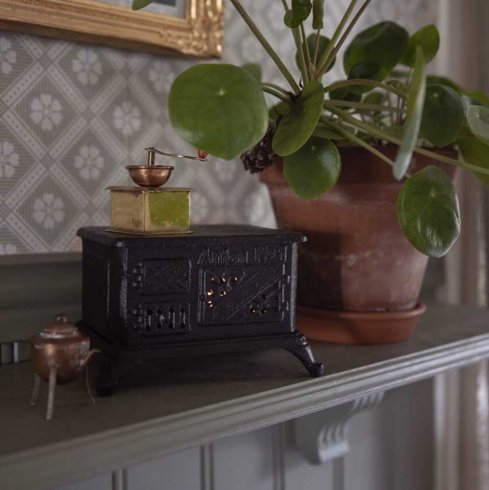 Kamin för värmeljus